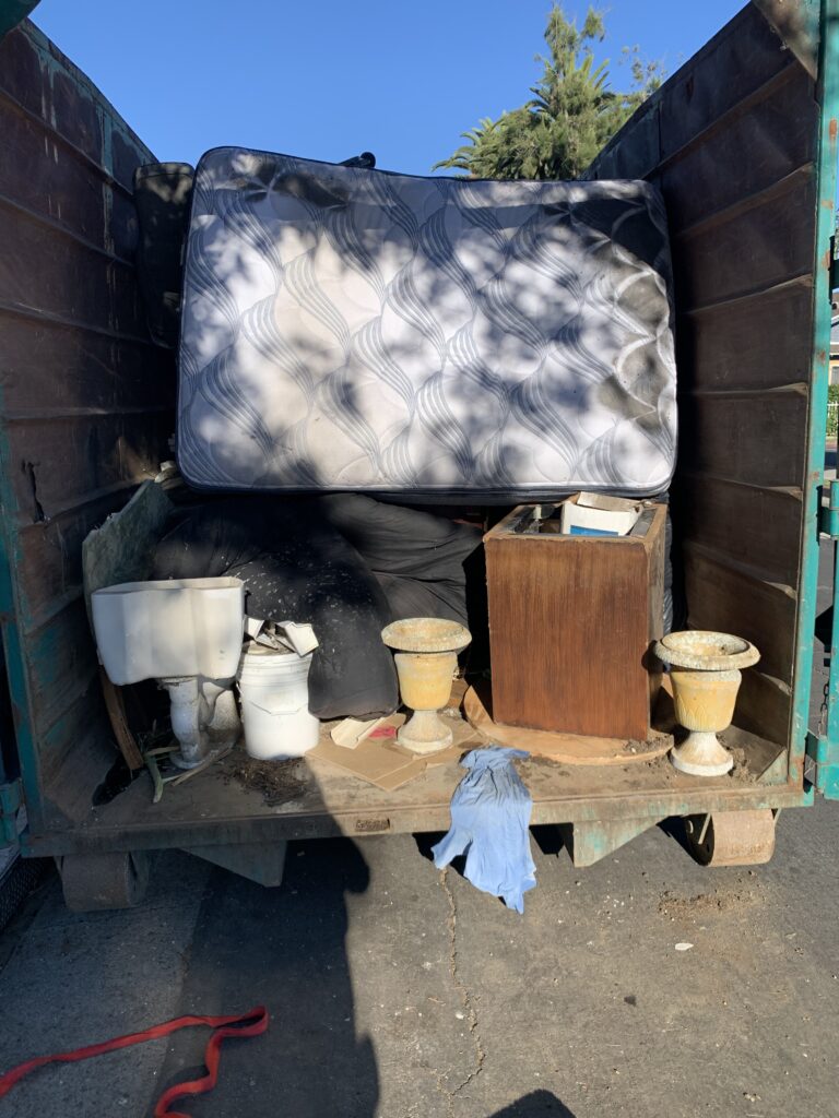 Stanford Avenue Clean up -dumpster with mattress, toilet 8-26-2023